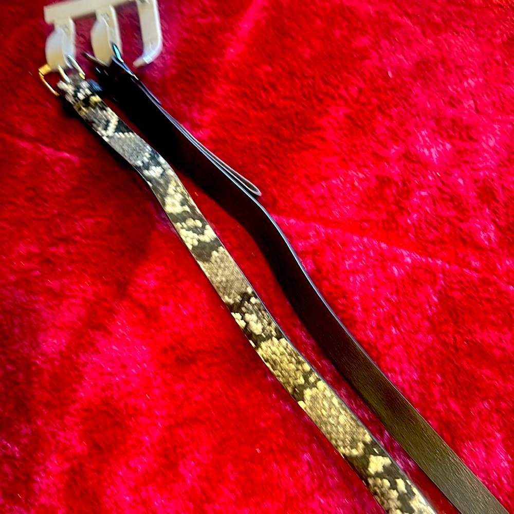 Set of 2  new belts.  Size large 48 inches total length.